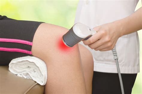 Laser therapy is applied to a patient's knee.